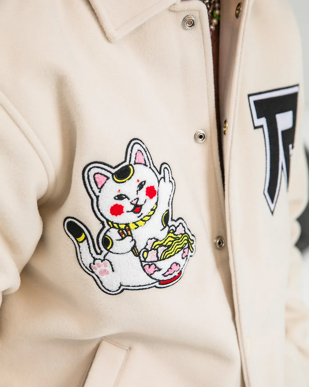 RIPNDIP LUCKY NERM VARSITY JACKET-CREAM